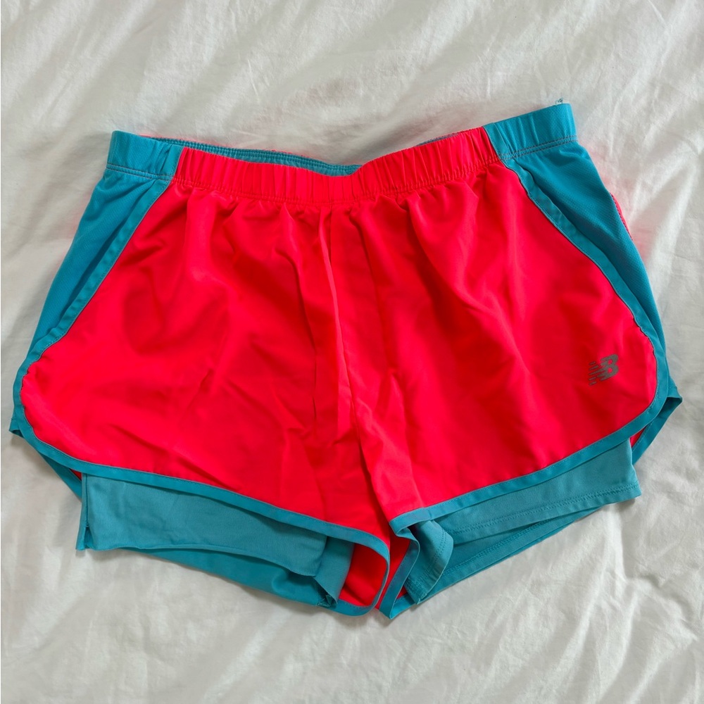 New balance pink and blue running shorts